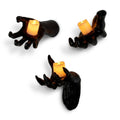 Set of Three Wall-Mounted Monster Hand Candle Holders with Warm LED Candles