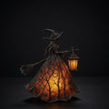 Witch Silhouette Table Lamp with Warm Amber Glow and Stained Glass Dress Design