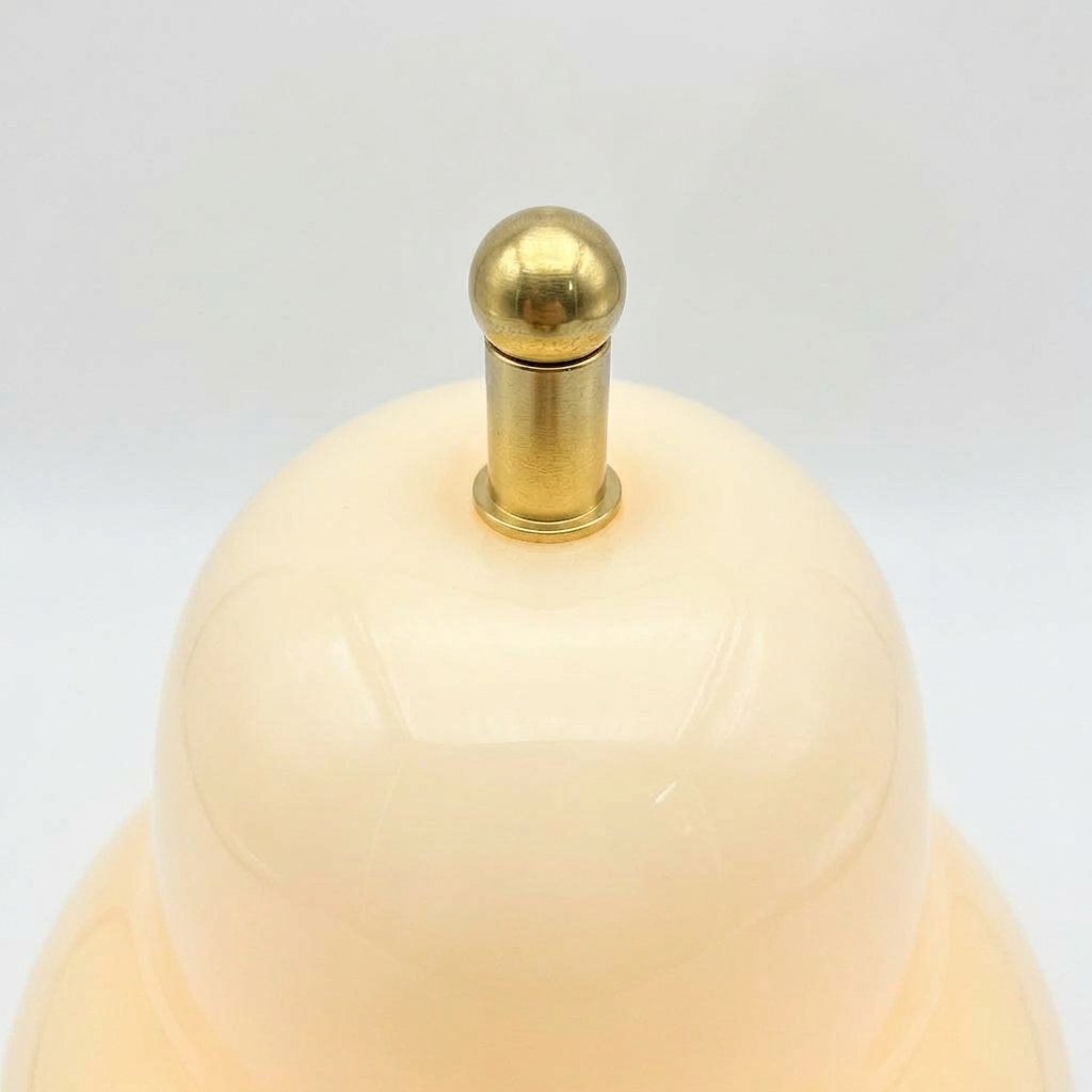 Pear-shaped glass table lamp with warm ambient glow