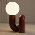 Sculptural Arch Table Lamp with Frosted Globe Shade — Burgundy